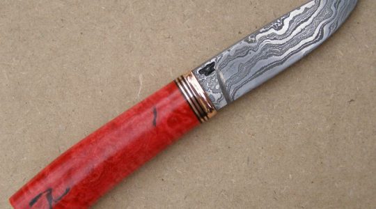 Pink ivory knife handles. Pink ivory knife handles.